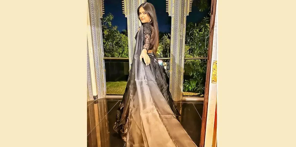 Madhurima Tuli in a black ensemble lehenga