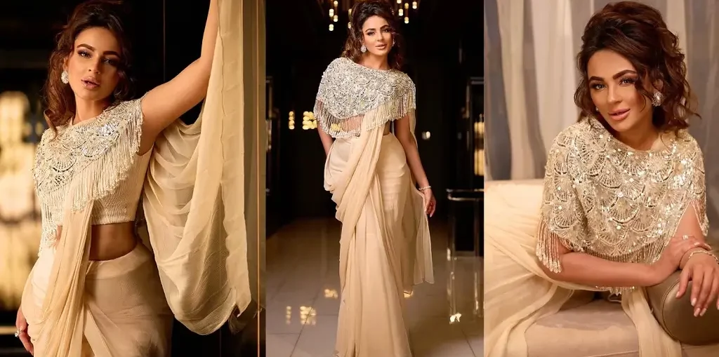 Seerat Kapoor wearing An Ethnic Embellished Cape with a Crop Top and Draped Saree