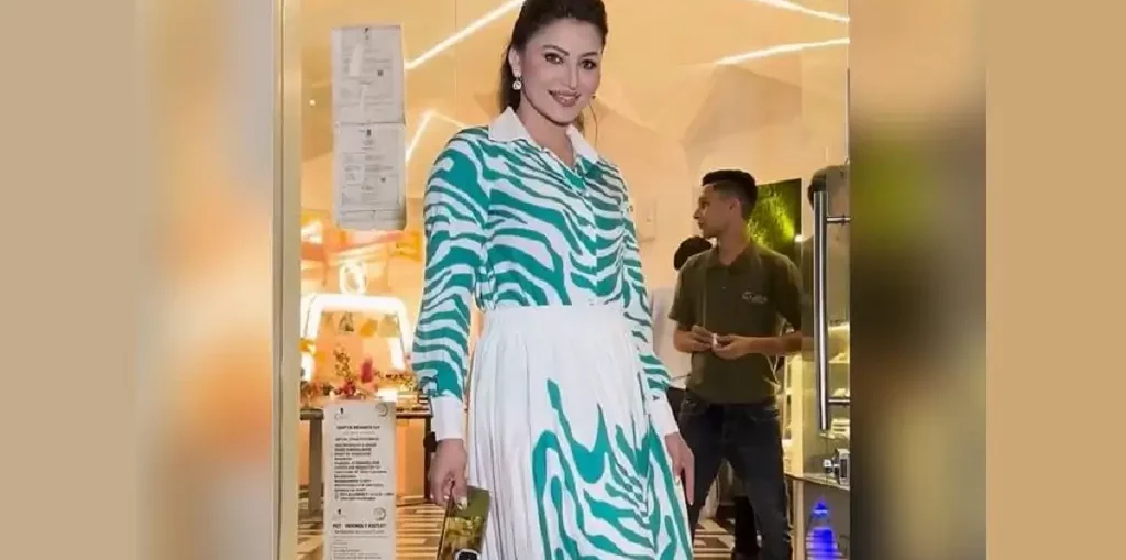 Urvashi Rautela in Juhu in a beautiful green & white zebra print pleated skirt and shirt